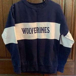 Michigan Wolverines sweatshirt.